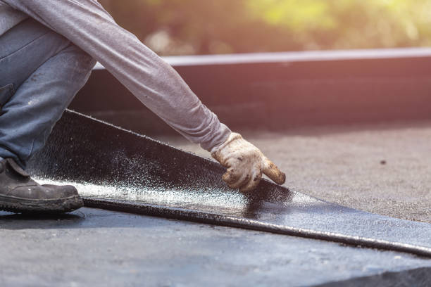 Professional Basement Waterproofing technician working in La Grange, KY